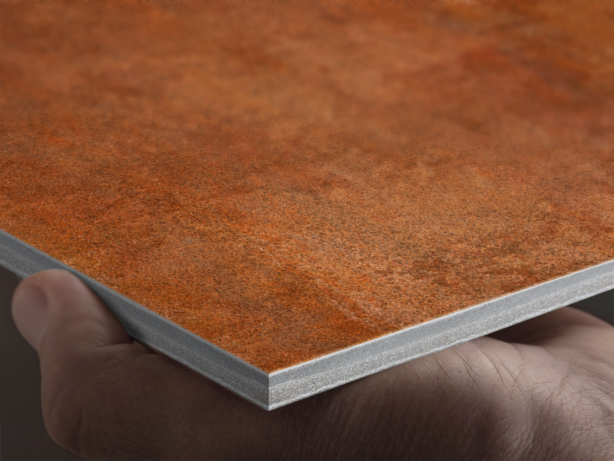 Close-up of a rust-textured fibre cement panel, showcasing a rich, weathered finish and durable construction.